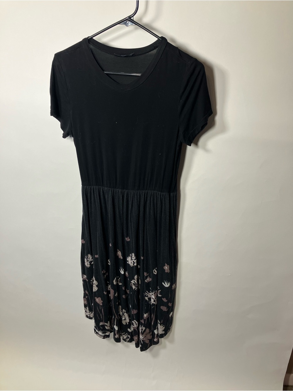 Black Short-Sleeve Midi Dress with Subtle Floral Skirt